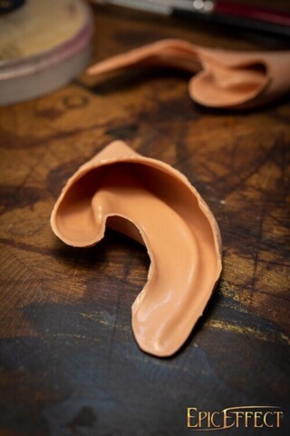 Elverører, Protese, Medium